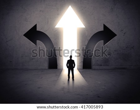 A businessman in doubt, having to choose between three different choices indicated by arrows pointing in opposite direction concept Royalty-Free Stock Photo #417005893