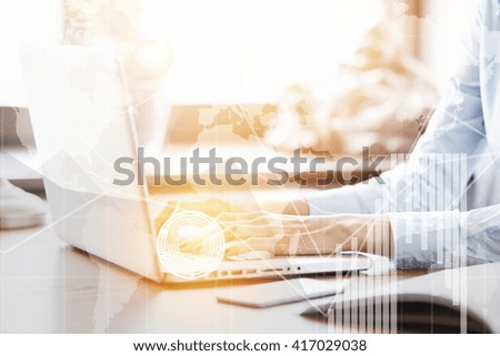 Picture of female sales manager of a big trade company working on new business project. Close up view of woman's hands typing message on generic laptop in modern office. Worldwide connection interface