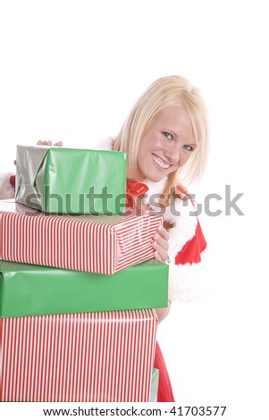 Santa's helper peeking around a stack of Christmas presents.