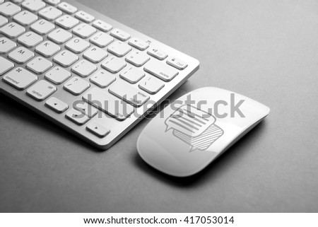 Social media icon on mouse & computer keyboard 