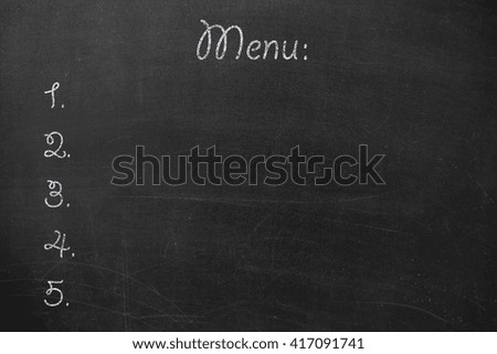 Menu written on a blank blackboard