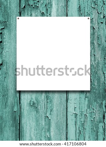 Close-up of one nailed square blank frame on aqua wooden background