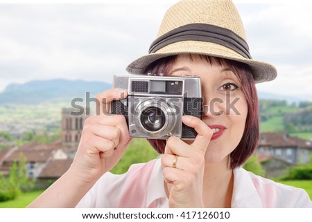 a young woman with vintage camera. youth lifestyle