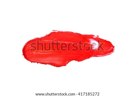Red color lipstick stroke on white background