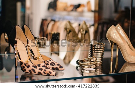 Shoes and accesories in a clothing boutique.