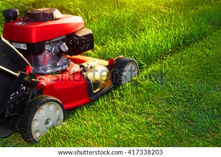 Lawn mower. Royalty-Free Stock Photo #417338203