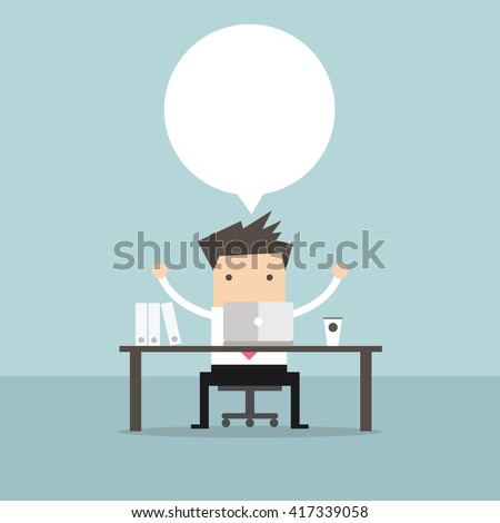 Businessman who sits at the table in front of the computer and about something thought.