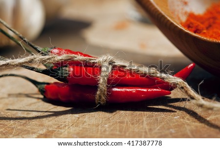 close up picture of a lot of red hot chilli peppers and spicy, g