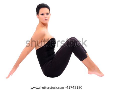 Attractive girl in black sport clothes represents letter M