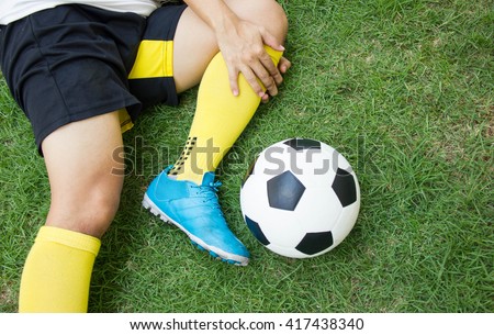 Close-up Of Injured Football Player On Field. Royalty-Free Stock Photo #417438340