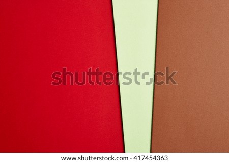 Colored cardboards background in red green brown tone. Copy space. Horizontal