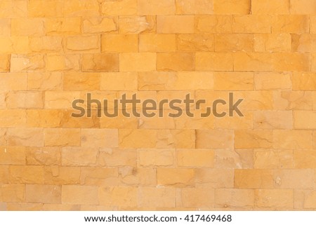 Red brick stone wall background.