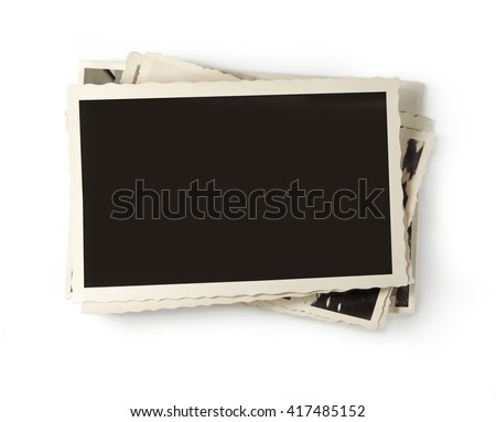 stack of old photos on white