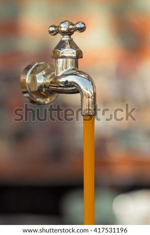 magic water tap
 Royalty-Free Stock Photo #417531196