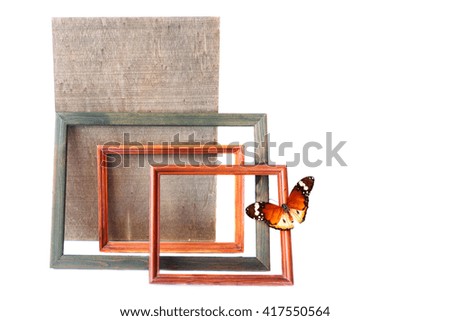Wood picture frames and butterfly.Isolated on white 