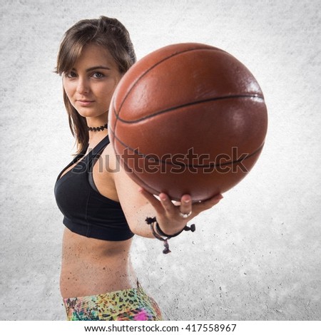 Young girl playing basketball