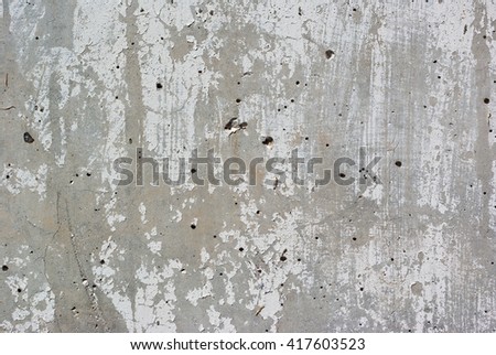 The old weathered white cement wall for design
