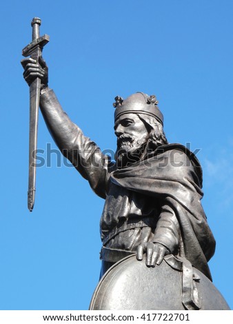 King Alfred The Great's statue designed by Hamo Thornycroft and erected in 1899 stands at the eastern  end of the Broadway in Winchester, Hampshire, England Royalty-Free Stock Photo #417722701