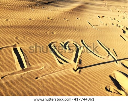 Beach Sand " I love you" Royalty-Free Stock Photo #417744361