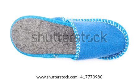 Pair of blue house slippers isolated over white background