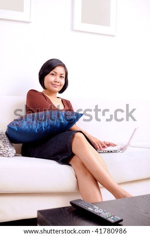 Women working on laptop at home
