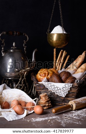 Variety of pastry and bread with organic brown eggs.