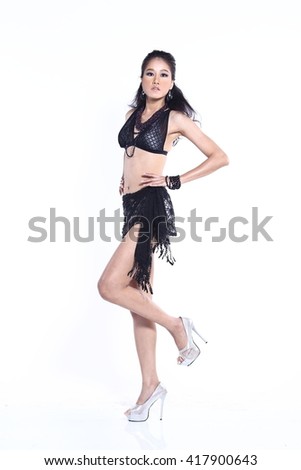 Beautiful Asian Thai Model Female in Fashion Black Sport Swim Suit Fashion Make Up with Accessory on White Background in Studio Lighting, isolated, stand full body