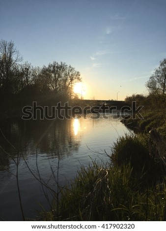 Sunsets right above the Humber river Royalty-Free Stock Photo #417902320