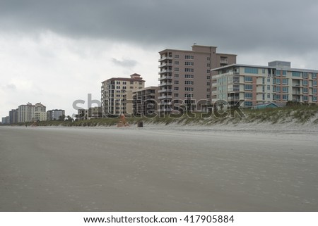 Vacation lifestyle: Hotel for tourists at Jacksonville Beach, Florida, on a cloudy sunset