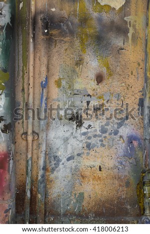 Wall and vertical sewage pipe with spray paint marks Royalty-Free Stock Photo #418006213