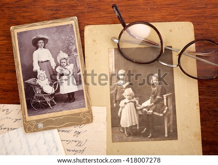 CIRCA 1915: Vintage family portraits of children