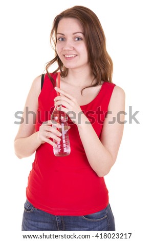 beautiful girl drinking fresh water from a bottle on white background in Studio