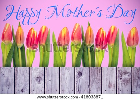 Mothers day greeting against wooden planks