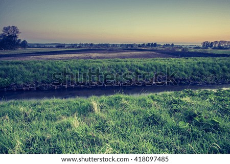 rural landscape on sunrise. Vintage photo