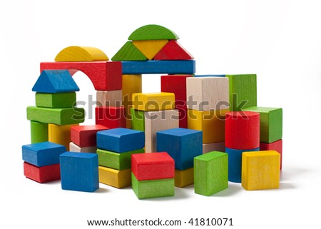 city of colorful wooden toy blocks isolated on white background
