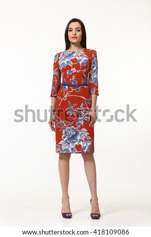 asian eastern brown hair business executive woman with straight hair style in formal party red blue print floral dress high heel shoes going full body length isolated on white