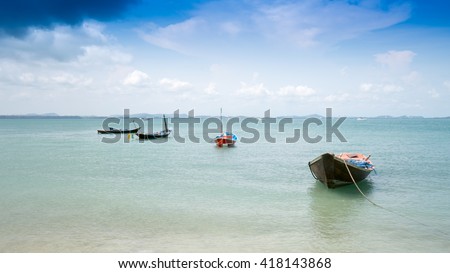 Fishing boat  at The beautiful island of Koh Samed, located in the gulf of Thailand,One of the most beautiful and most popular beaches Ao Klang on Koh Samet.Crystal Sand Beach at Samet Island thailand
