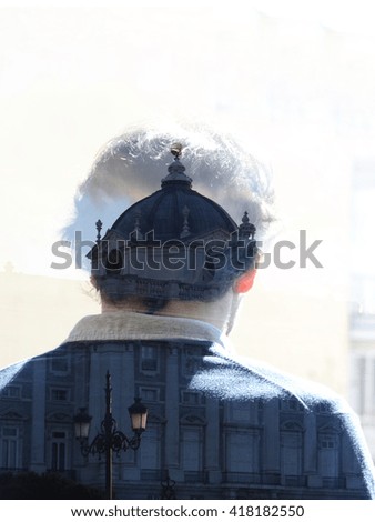 man from backside and historic building. Double exposure photography