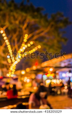 image of blur restaurant in night time for background usage .