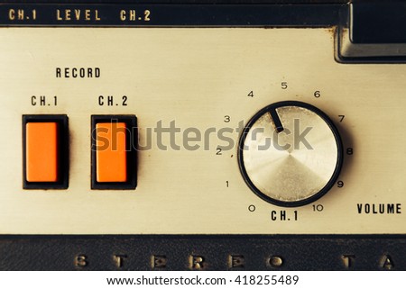 Knobs and buttons of old tape recorder open