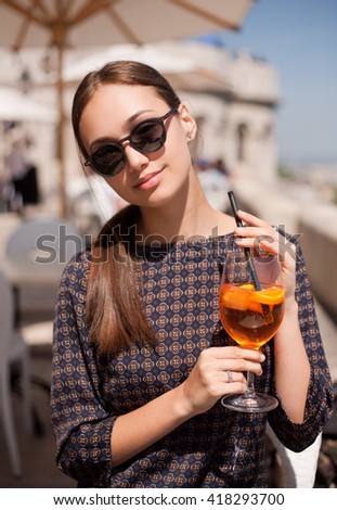 Portrait of a young gorgeous tourist woman enjoying the view.