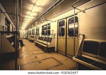 Interior of empty carriage Moscow subway. ISO 800, grain. instagram image filter retro style
