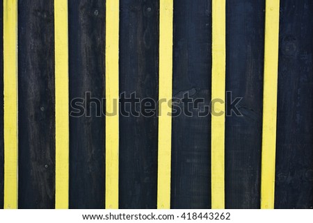 Blue and yellow wood separated to background