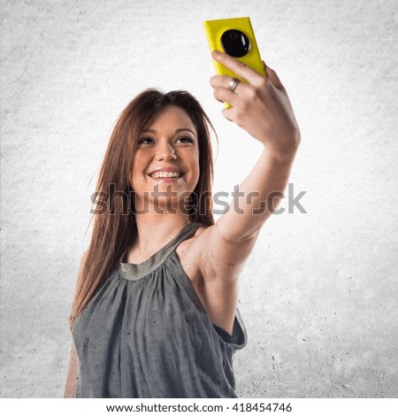 Young girl making a selfie