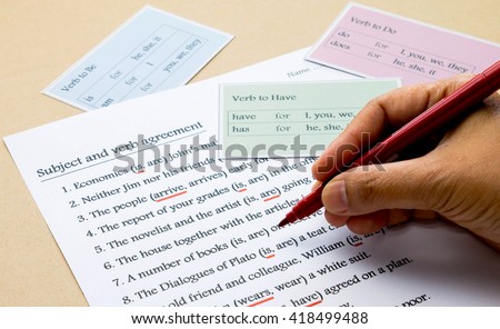 english grammar exercise with grammar cards on table Royalty-Free Stock Photo #418499488