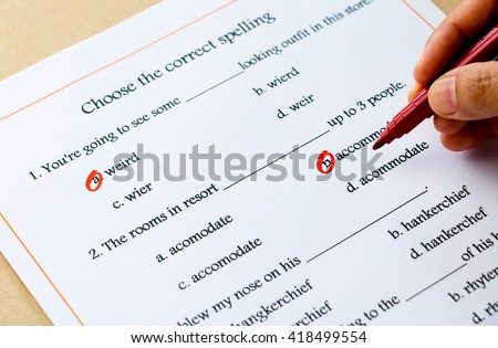 red pen marked on multiple choices on english spelling vocabulary test Royalty-Free Stock Photo #418499554