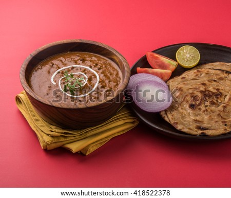 Dal Makhani or daal makhni, indian lunch/dinner item served with plain rice and butter Roti / Chapati /Paratha and salad