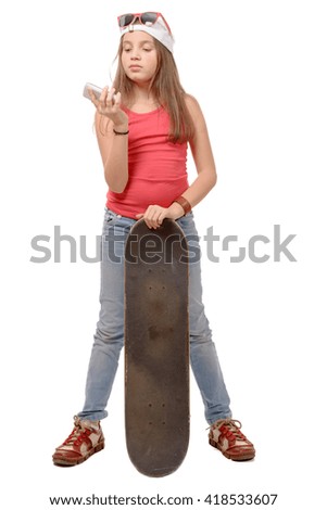 a fashion pretty little girl with skateboard, isolated on white
