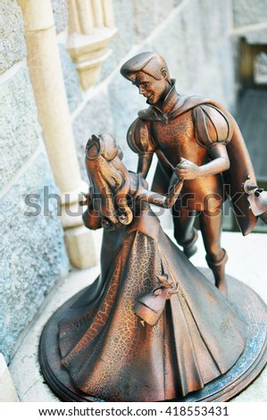 Figurine of Romantic scene of a fabulous prince and princess dancing happily ever after