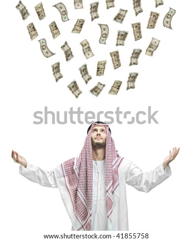 Money falling  from the air into the hands of a young Arabic businessman isolated on white background